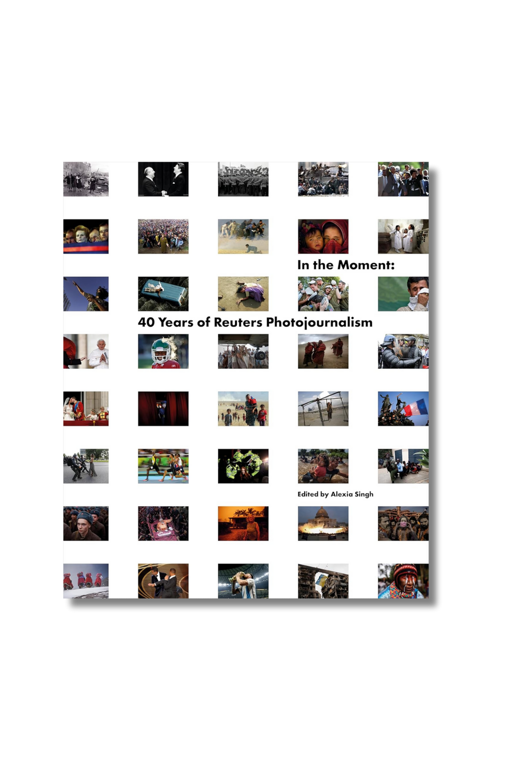 In The Moment: 40 Years of Reuters Photojournalism Hardcover - 0
