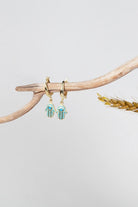 Arven’s World by Aylin Işıklı-Hamsa Gold Küpe-Küpe-3-Milagron.com