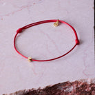 Red Cord Bracelet In Gold