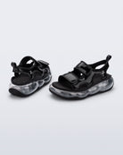  X Icon Sandal Ad